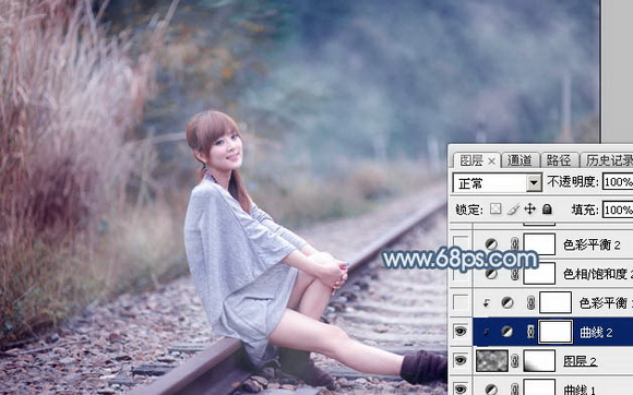 Photoshop给铁轨上的美女加上梦幻的淡蓝色